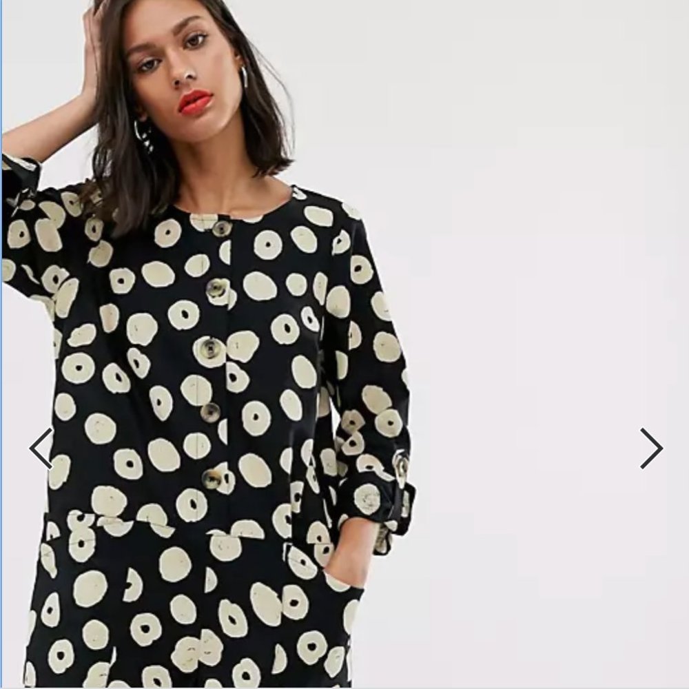 Long sleeved button front romper